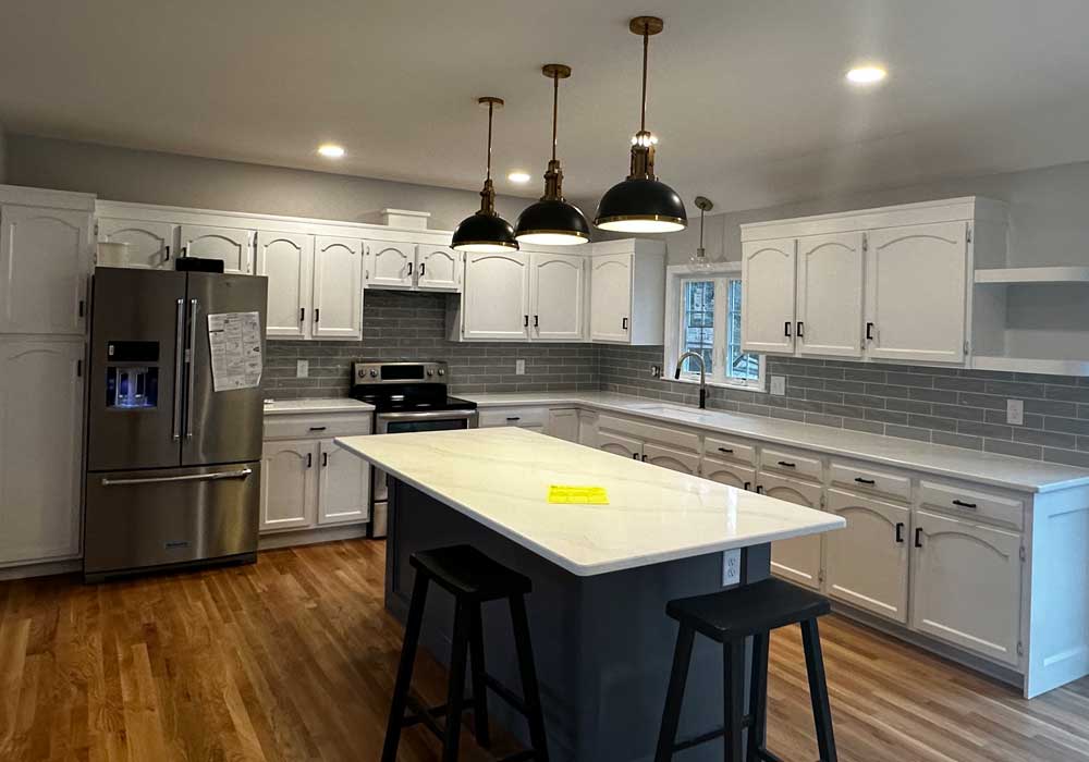 custom kitchen with island, countertops and cabinets